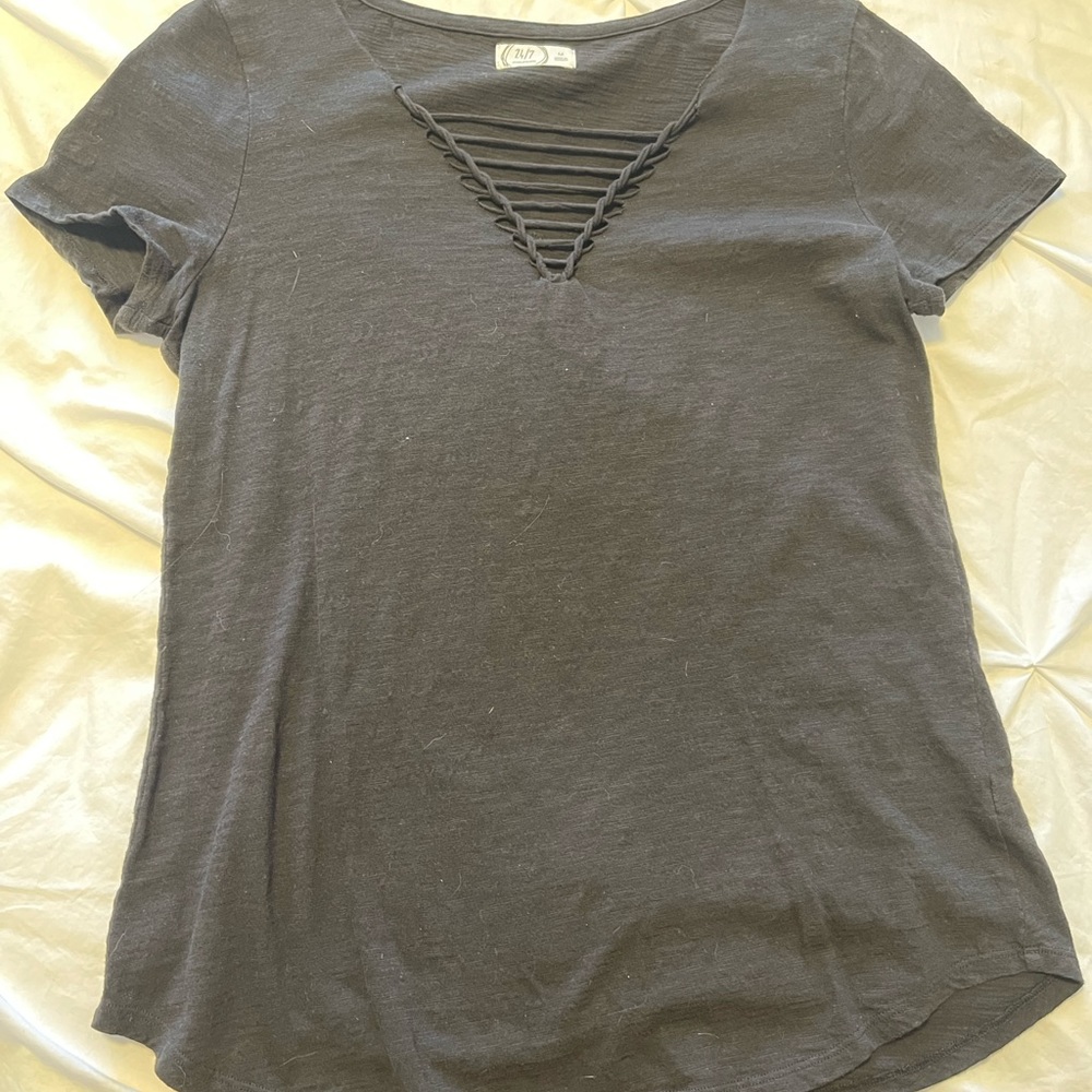 Black T-shirt from Maurice’s with cross cross design on chest